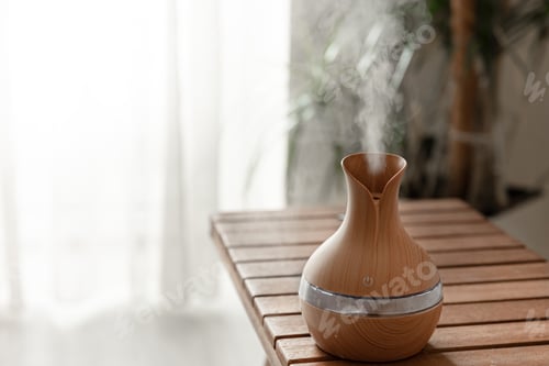 Preview: Aroma oil diffuser lamp on a blurred background.