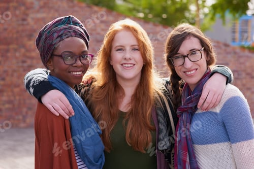 Preview: Enjoying campus life. Portrait of a group of university students on campus.