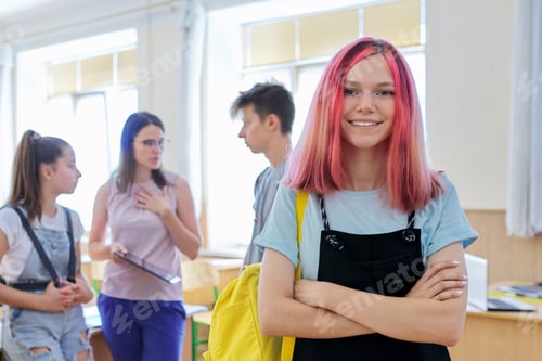 Preview: Teenage Girl Smiling in a School Classroom