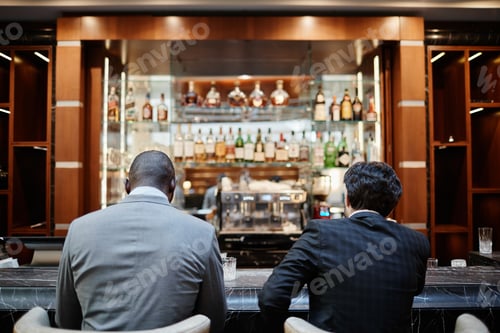 Preview: Business People at Bar Counter Back View