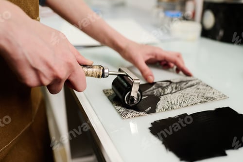 Preview: Applying black ink on handmade artwork
