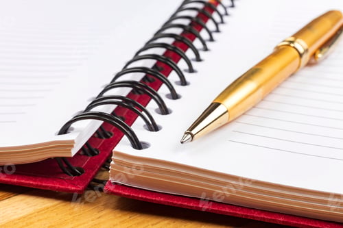 Preview: notebook and luxury pen close up with a blurred background