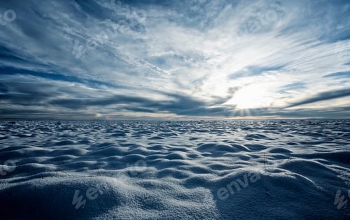 Preview: A snow covered field and a view to the horizon.
