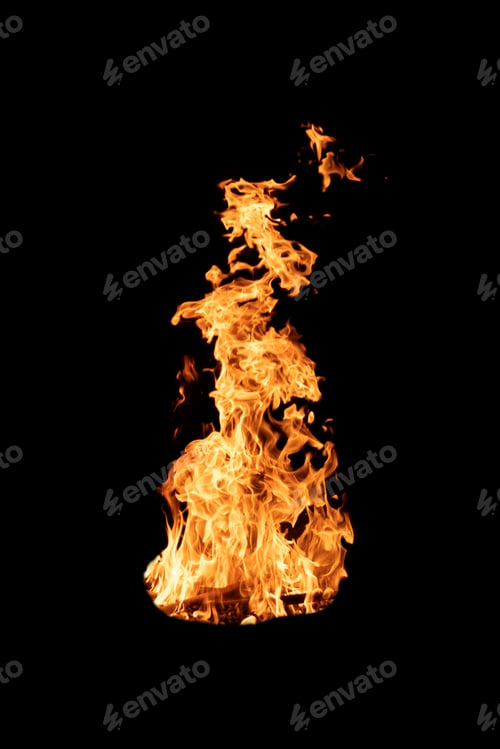 Preview: Fire flame burning isolated on dark background. Abstract fireplace burning light on black backdrop.
