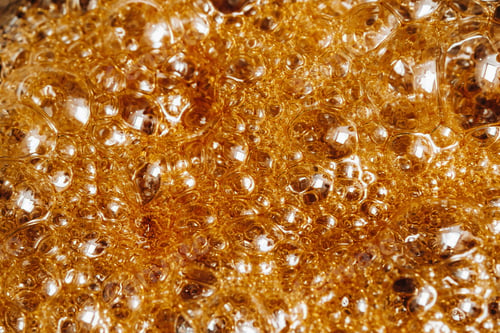 Preview: Preparation of sugar candies at home.A taste of our childhood.Background, sugar bubbles Texture