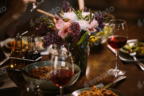 Preview: close-up view of delicious dishes and cutlery on table served for dinner