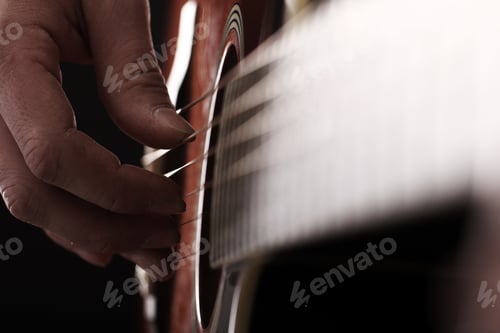 Preview: Musician playing on guitar