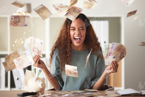 Preview: One happy young mixed race woman feeling rich and successful while throwing money at home. Excited