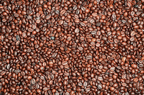 Preview: Background texture of a huge number of fragrant and fresh brown roasted coffee grains