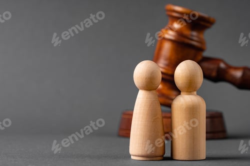 Preview: Wooden toy family and judge mallet. Family divorce concept