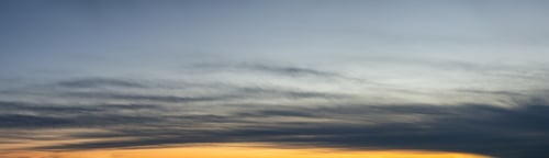 Preview: Panoramic View of colorful cloudscape during a sunny morning sunrise