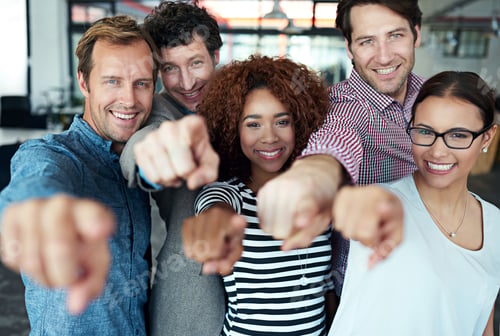 Preview: We want you. Portrait of a group of office colleagues pointing at the camera.