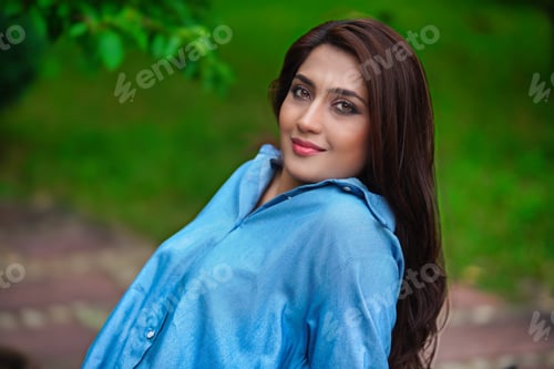 Preview: Portrait of a beautiful woman in nature