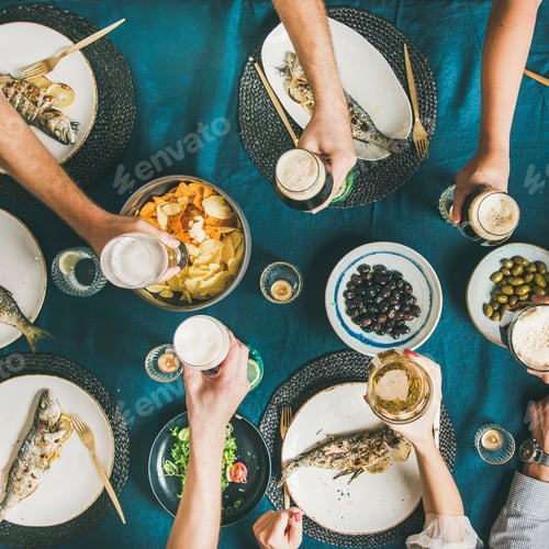 Preview: Friends eating fish and chips and drinking beer, square crop