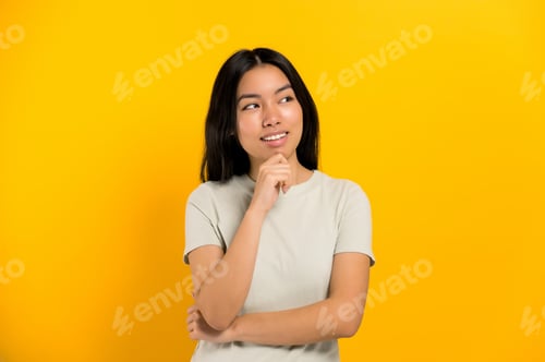 Preview: Positive millennial Asian brunette young woman, minded, smart, creative girl, look up empty space