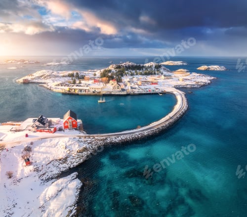 Preview: Aerial view of road, bridges, snowy islands, rorbu, sea at sunset