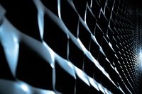 Preview: Industrial background of diagonal metallic protrusions illuminated with strong