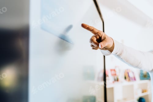 Preview: Teacher explaining some ideas on a touch TV to his students.