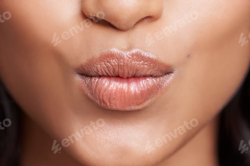 Preview: And one for you. Cropped shot of a womans beautiful lips.