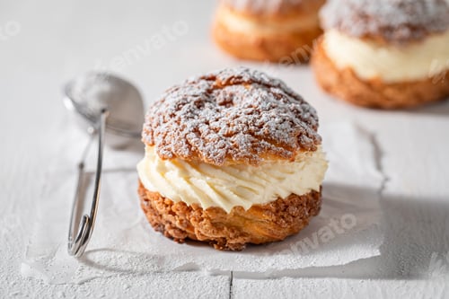 Preview: Homemade and tasty cream puffs made of sugar and cream
