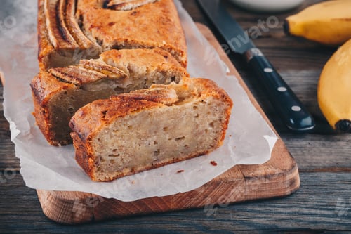 Preview: homemade banana bread on a wooden background