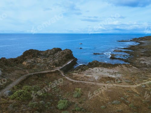 Preview: Atlantic Ocean and southern coast of Tenerife seen from the drone, trails of the Punta Rasca natural
