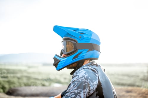 Preview: Rider in helmet outdoors