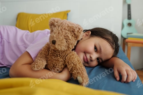 Preview: Girl With Toy Resting In Bed