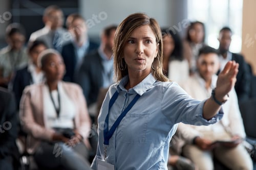 Preview: Shot of a businesswoman delivering a presentation at a conference