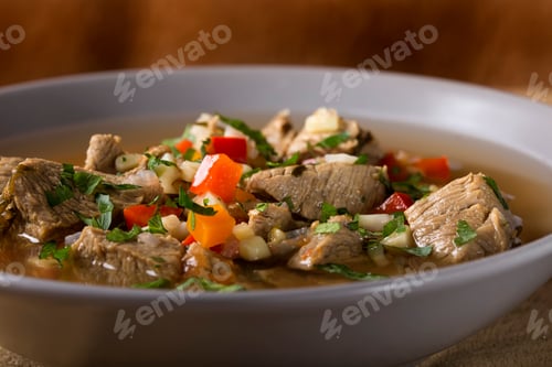 Bowl of Hearty Meat and Vegetable Soup