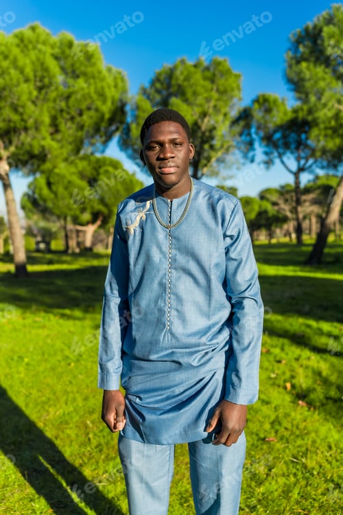 Preview: Senegalese man wearing traditional dashiki in public park