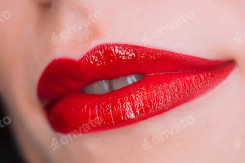 Preview: Glossy passionate red lips. Woman with liquid lipstick or gloss. Shiny smile. Lady with natural lip