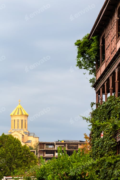 Preview: cupola of cathedral and gray cloudy sky in Tbilisi