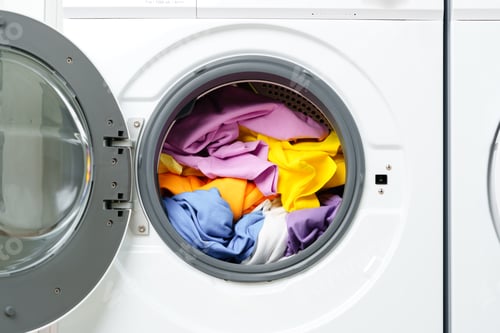 Preview: White Washing Machine With Open Door in a Laundry Room