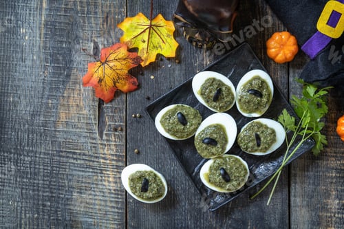 Preview: Halloween funny idea for party food. Halloween creative stuffed eggs.