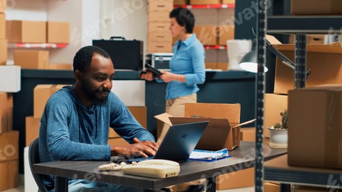 Preview: Young entrepreneurs shipping products from storehouse
