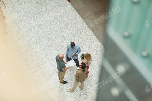 Preview: Business people at office building