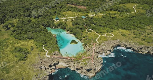 Preview: Limpid lake at green tropic nature landscape aerial view. Picturesque landmark of Weekuri lagoon