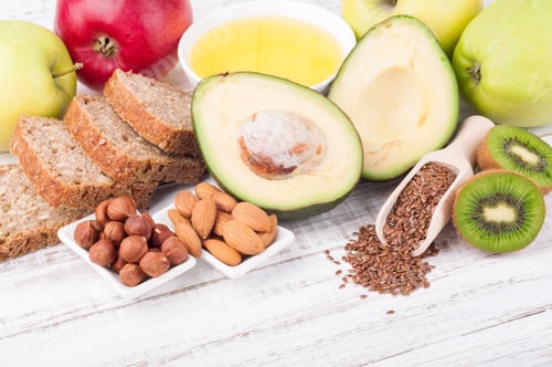 Preview: Healthy fats sources and healthy food - avokado, flax seeds, olive oil, whole grain bread