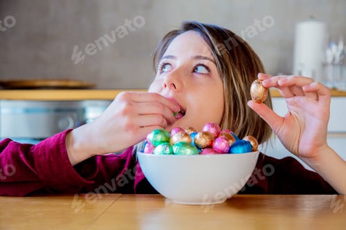 Preview: Adult woman and Easter eggs in plate