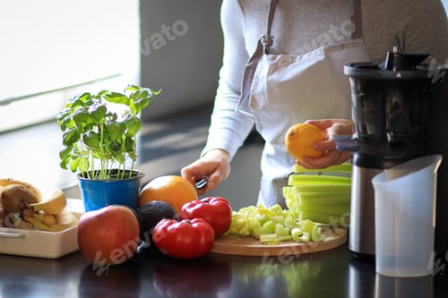 Preview: Cooking at home kitchen,preparaing food to dinner,eating healthy,young woman preparing healthy food.