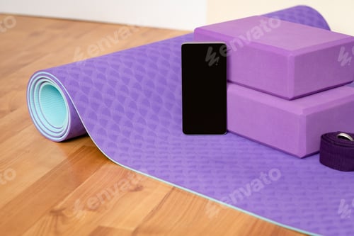 Preview: Yoga Mat and Blocks with Phone on Wood