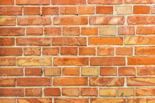Preview: Background of old vintage dirty brick wall with peeling plaster, texture