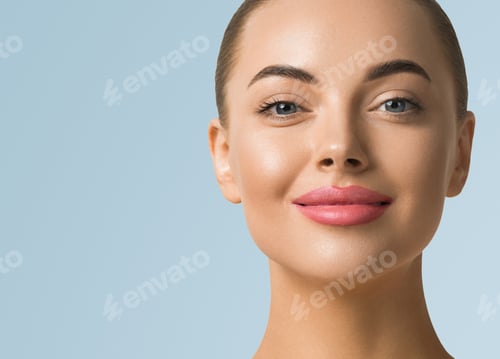 Preview: Clean skin woman face close up skin beauty tanned face beautiful smile over blue background