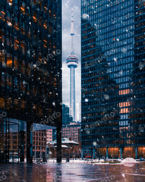 Preview: Beautiful Toronto tower with skyscrapers during snowfall