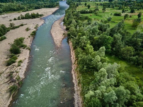 Preview: Aerial view of mountain river stream with stones valley landscape, Ukraine