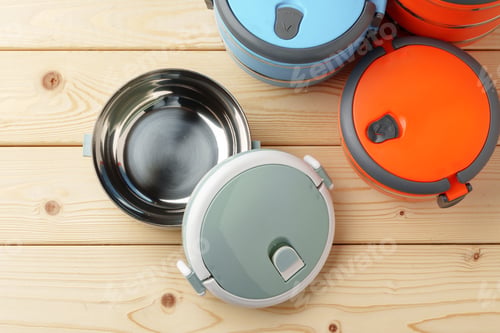 Preview: New empty plastic lunch box on a wooden background