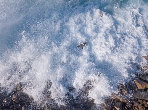 Preview: Rocky beach with Atlantic Ocean waves meeting with underwater sharp rocks