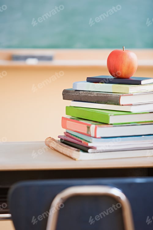 Preview: Apple on a stack of books