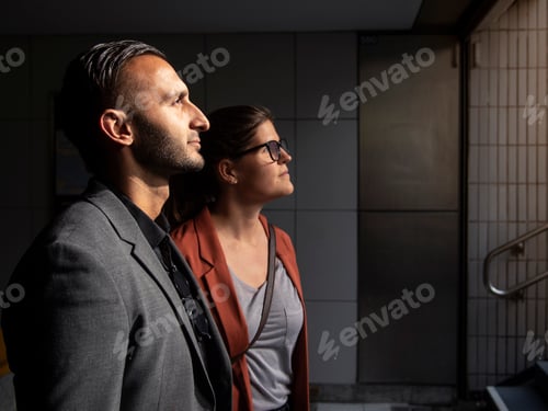 Preview: Man and woman standing by steps